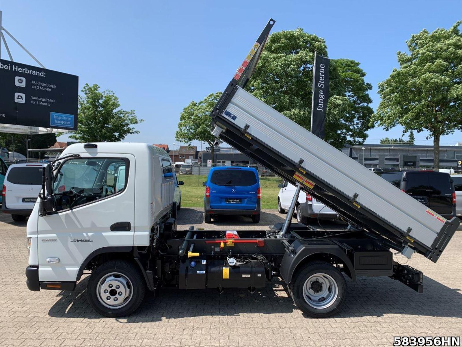 Fahrzeugabbildung FUSO Canter 3C15 Scattolini 3-Seiten Kipper Vfhrzg.