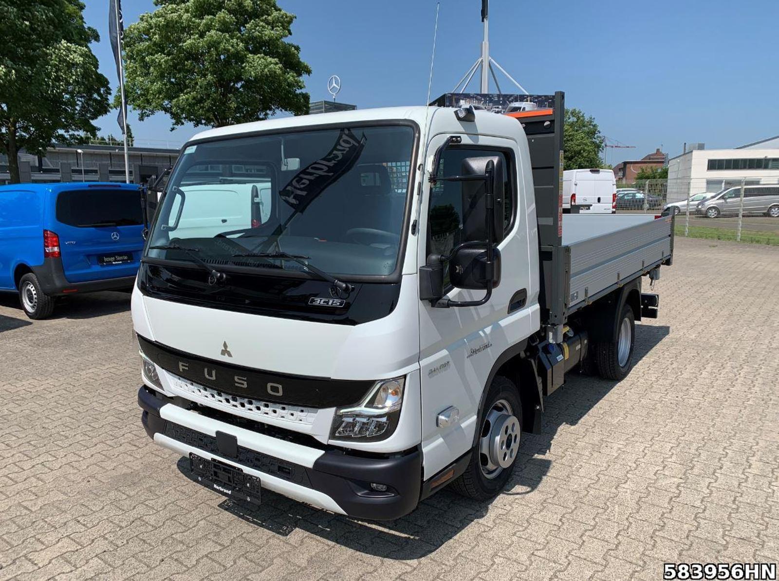 Fahrzeugabbildung FUSO Canter 3C15 Scattolini 3-Seiten Kipper Vfhrzg.