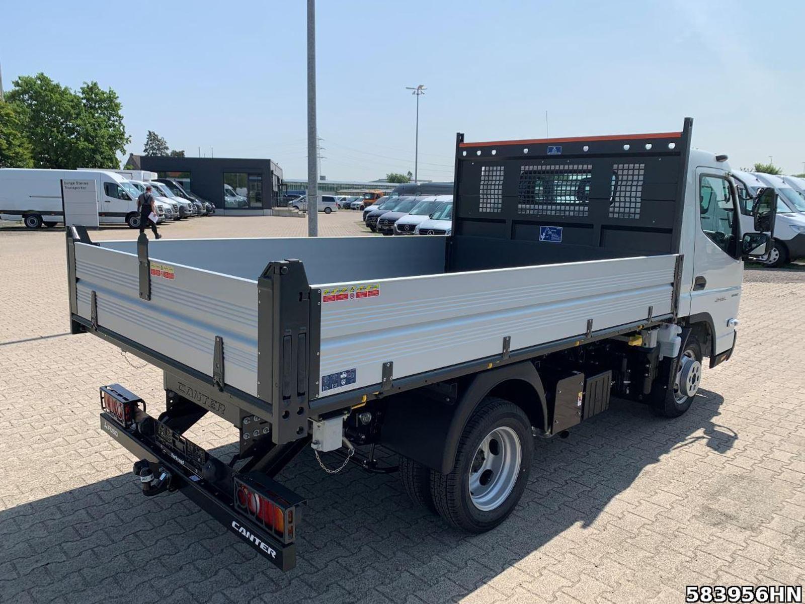 Fahrzeugabbildung FUSO Canter 3C15 Scattolini 3-Seiten Kipper Vfhrzg.