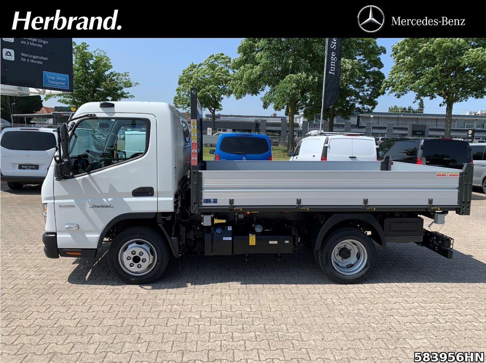 Fahrzeugabbildung FUSO Canter 3C15 Scattolini 3-Seiten Kipper Vfhrzg.