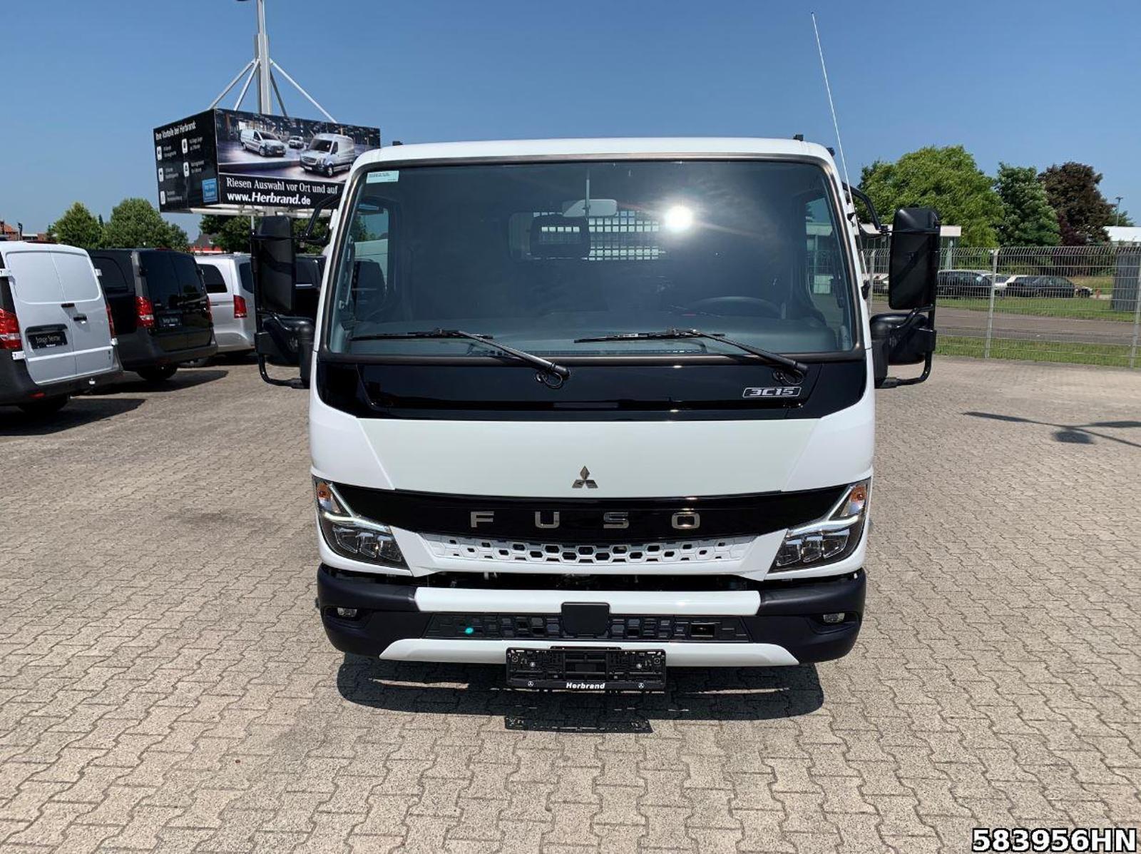 Fahrzeugabbildung FUSO Canter 3C15 Scattolini 3-Seiten Kipper Vfhrzg.